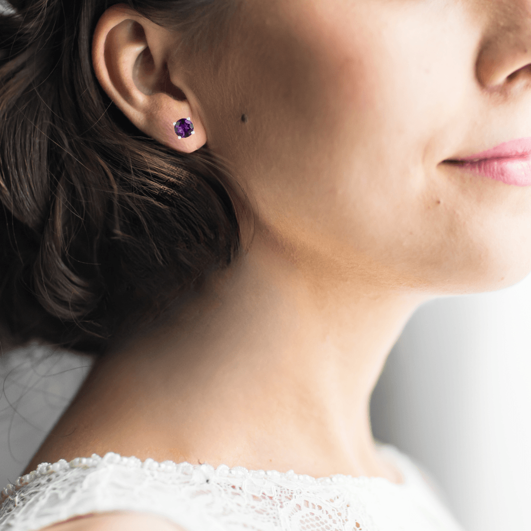 Model showcasing Solitaire Stud Earring Sterling Silver Earrings February Birthstone Amethyst Post Earrings Gift