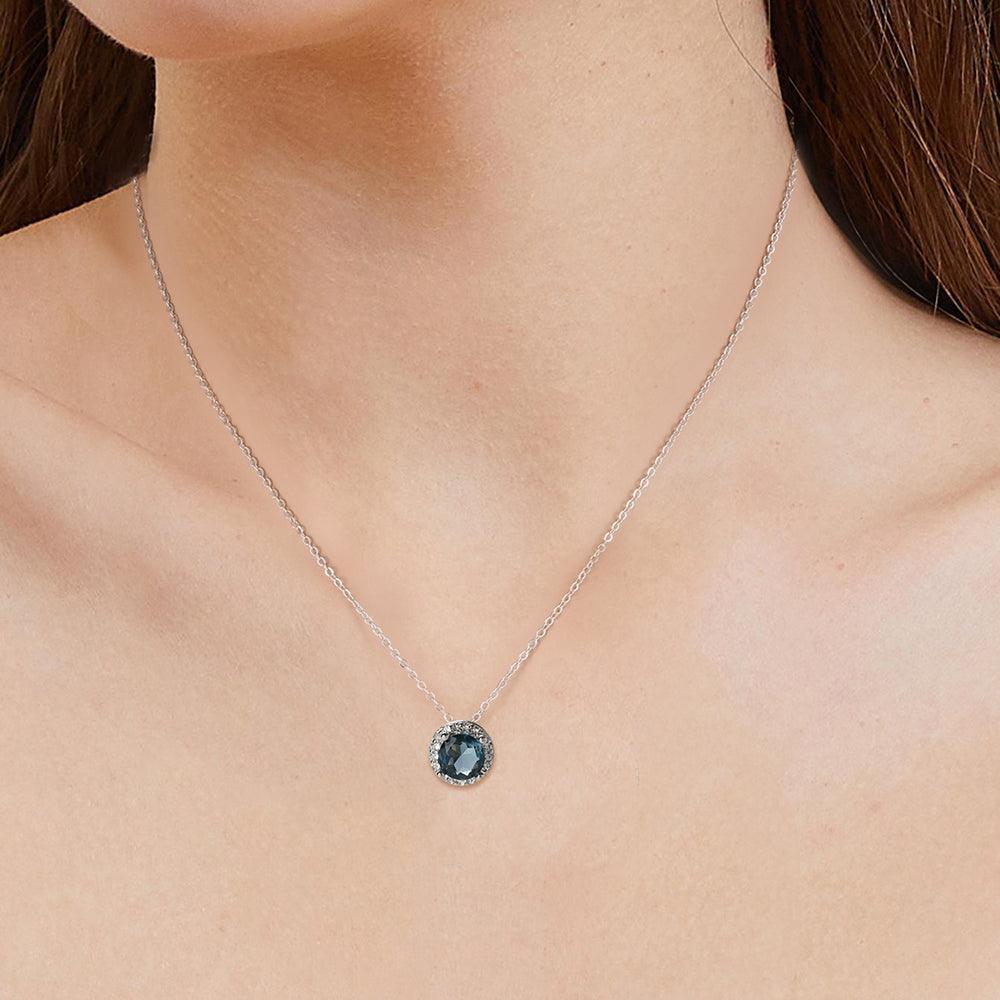 model showcasing Natural London Blue Topaz Halo Style Pendant Necklace - FineColorJewels