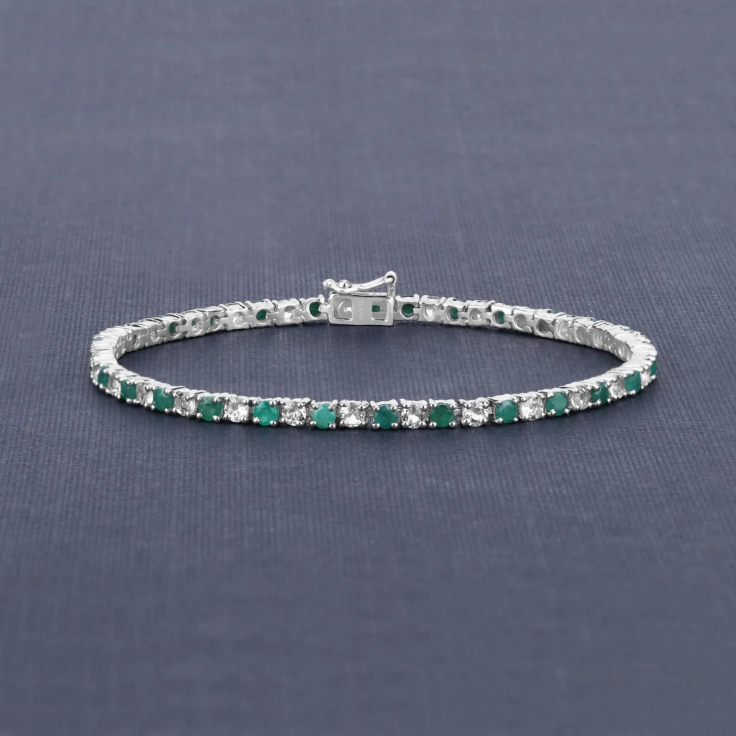 Genuine Emerald and White Topaz Tennis Bracelet