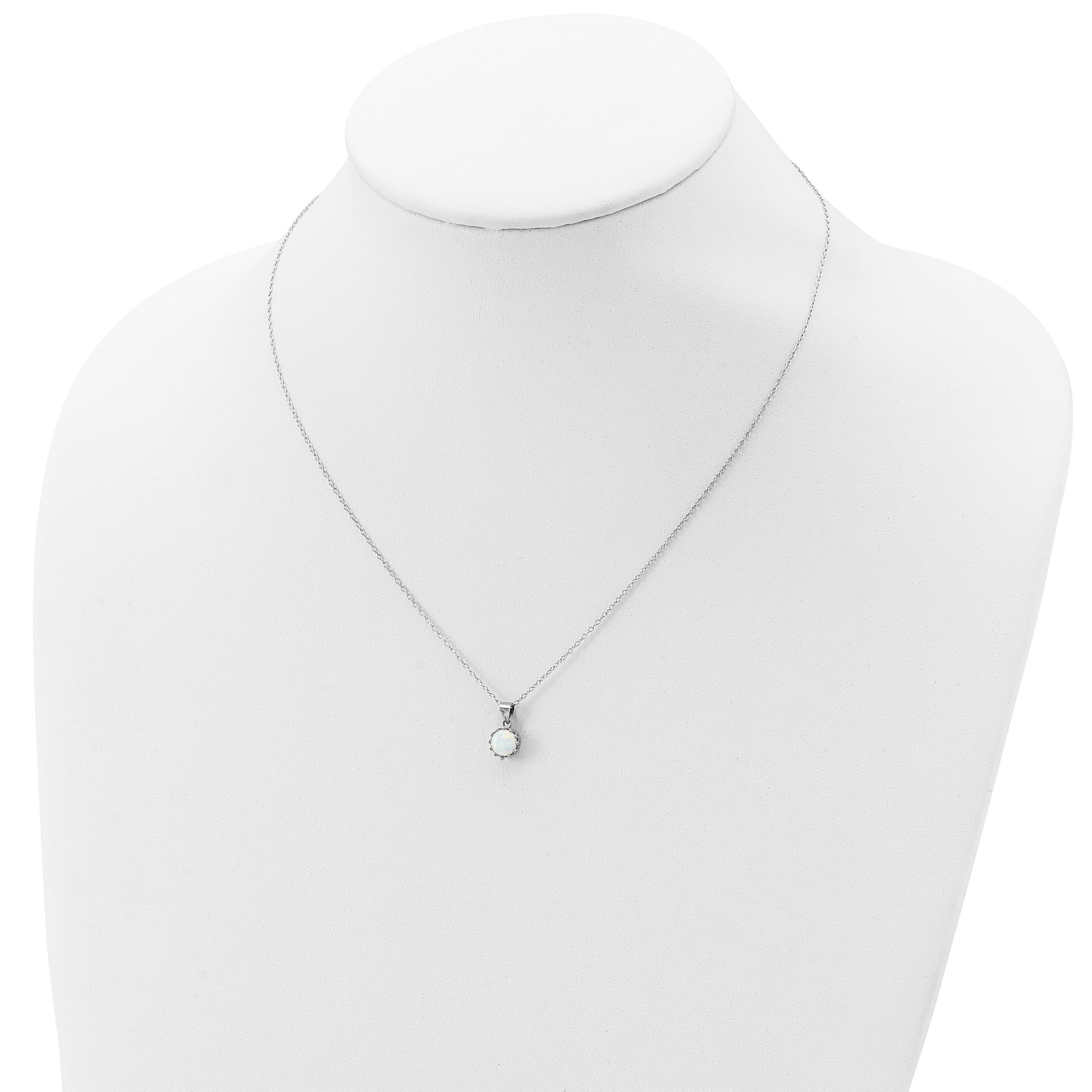 Opal gemstone pendant necklace on silver chain displayed on white jewelry bust
