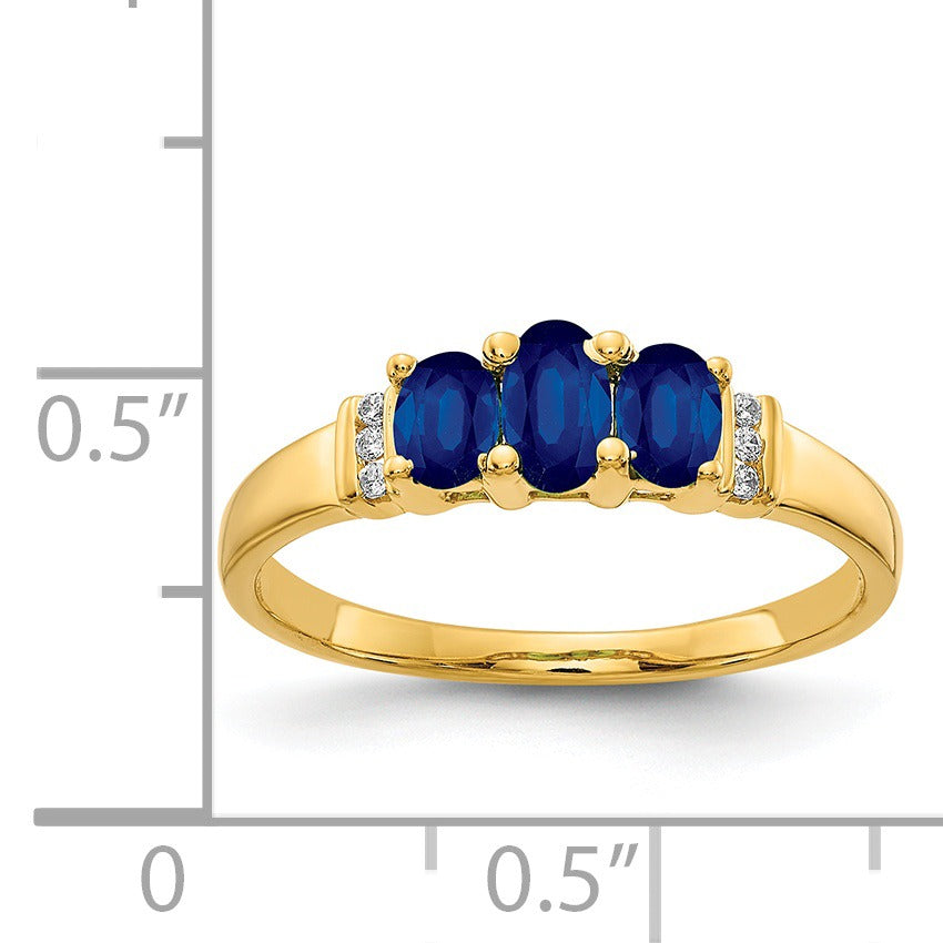 0.79 Ct Oval Blue Sapphire and Diamond Prong 14K Yellow Gold Three Stone Ring