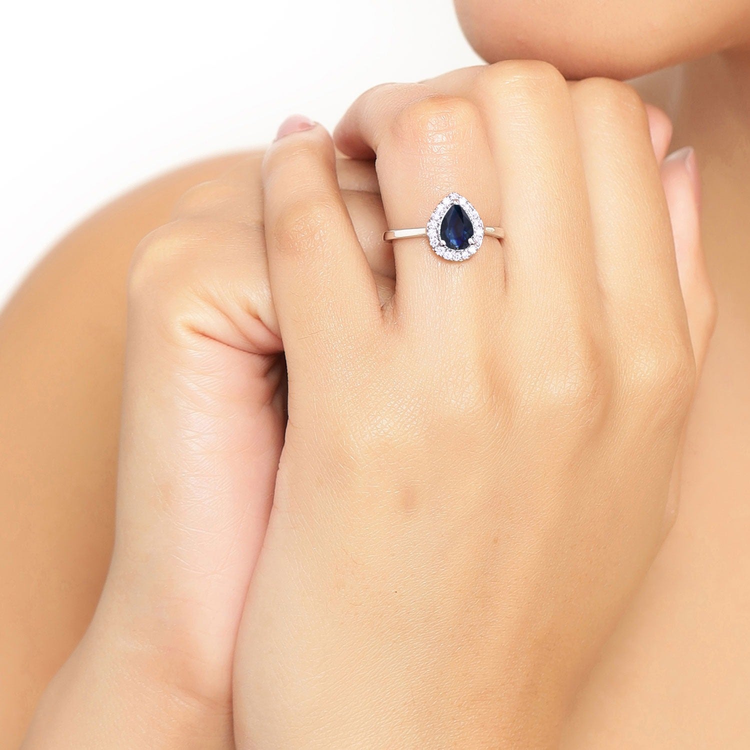 0.80 Ct Pear Blue Sapphire & Lab Diamond Prong Silver Halo Ring
