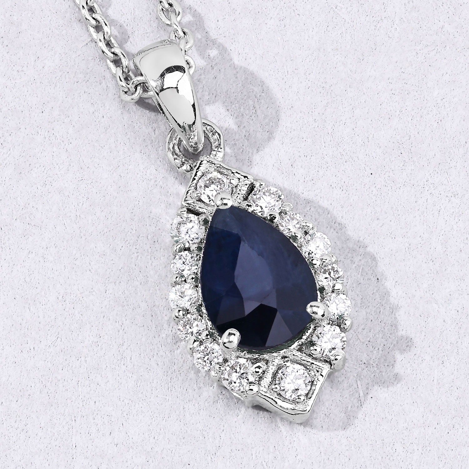 0.97 Ct Genuine Blue Sapphire and Lab Grown Diamond Silver Teardrop Necklace