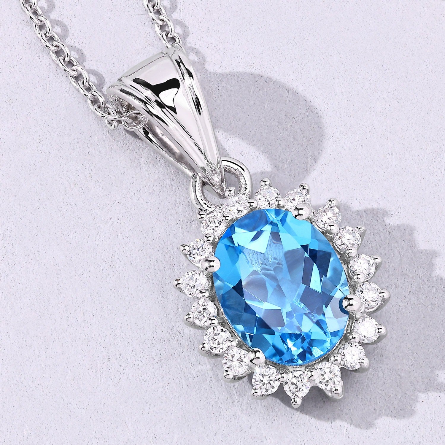 2.27 Carat Oval Genuine Swiss Blue Topaz and Lab Diamond Silver Halo Necklace