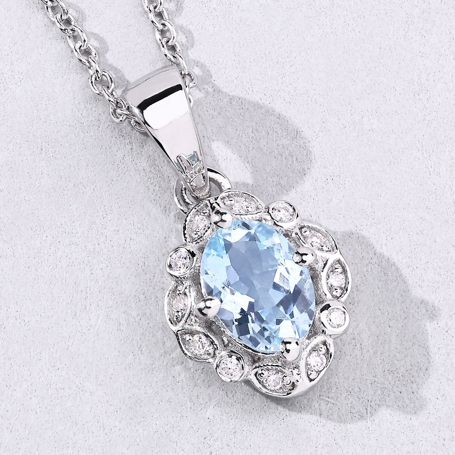 0.66 Ct Genuine Blue Aquamarine and Lab Diamond Silver Halo Necklace