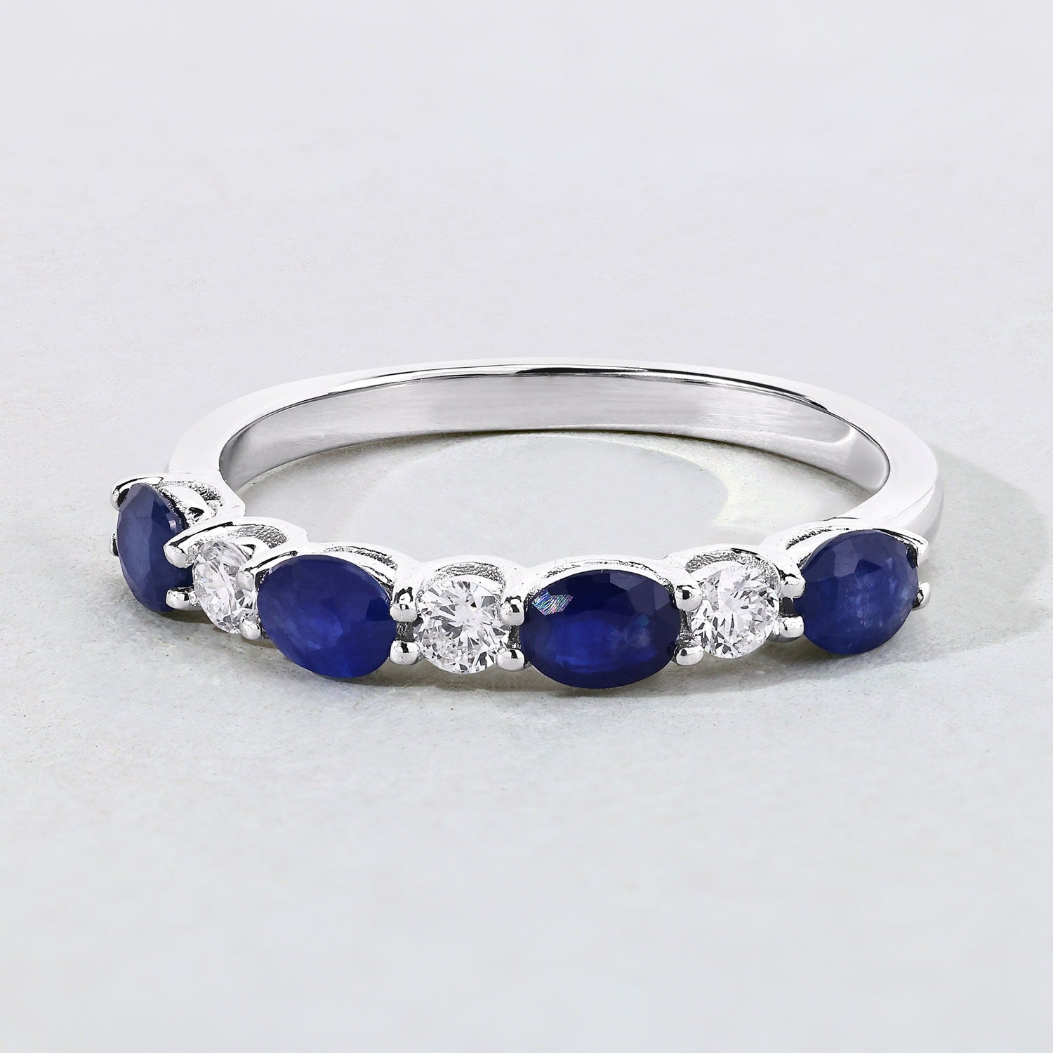 0.88 Ct Oval Blue Sapphire & Lab Diamond Prong Silver Half Eternity Seven Stone Ring