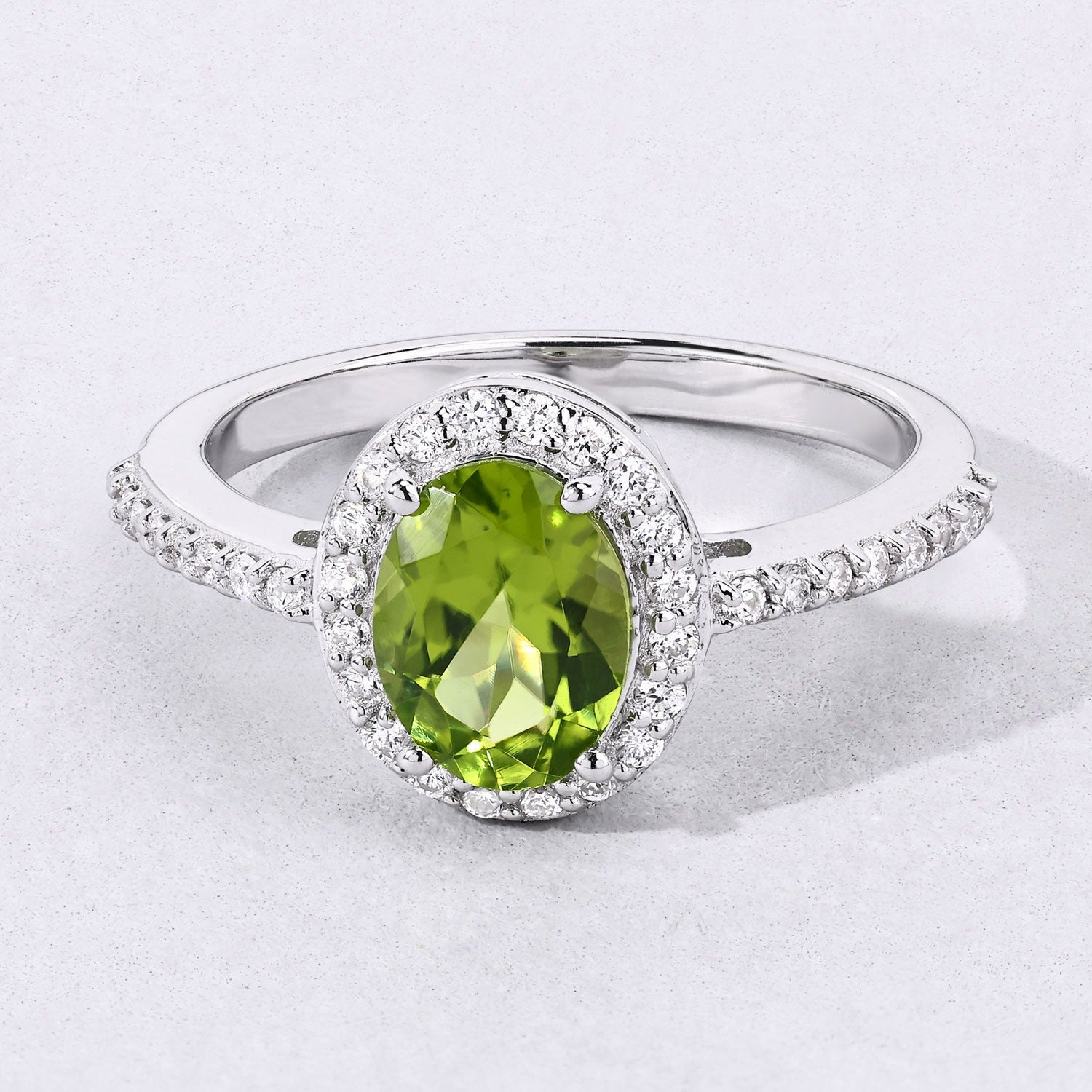 1.10 Ct Oval Green Peridot and Lab Diamond Prong Silver Halo Pave Ring