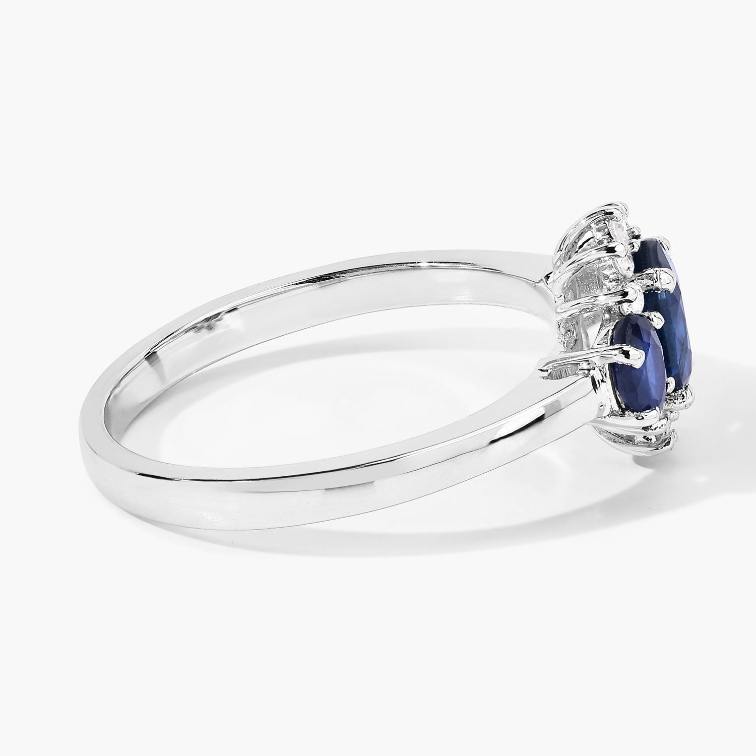 0.99 Ct Oval Blue Sapphire and Lab Diamond Prong Silver Three Stone Cocktail Ring
