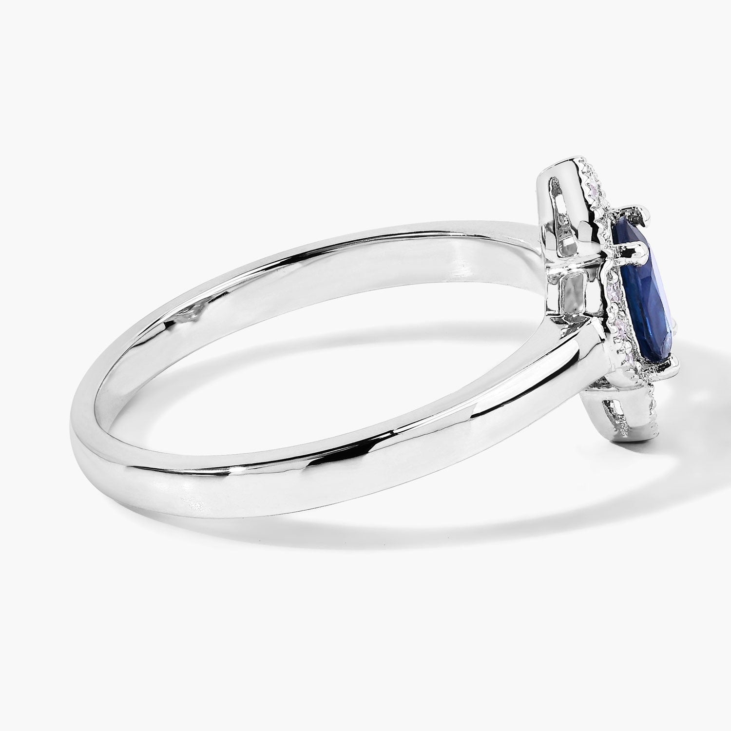 0.55 Ct Oval Blue Sapphire and Lab Diamond Silver Prong Floral Halo Ring