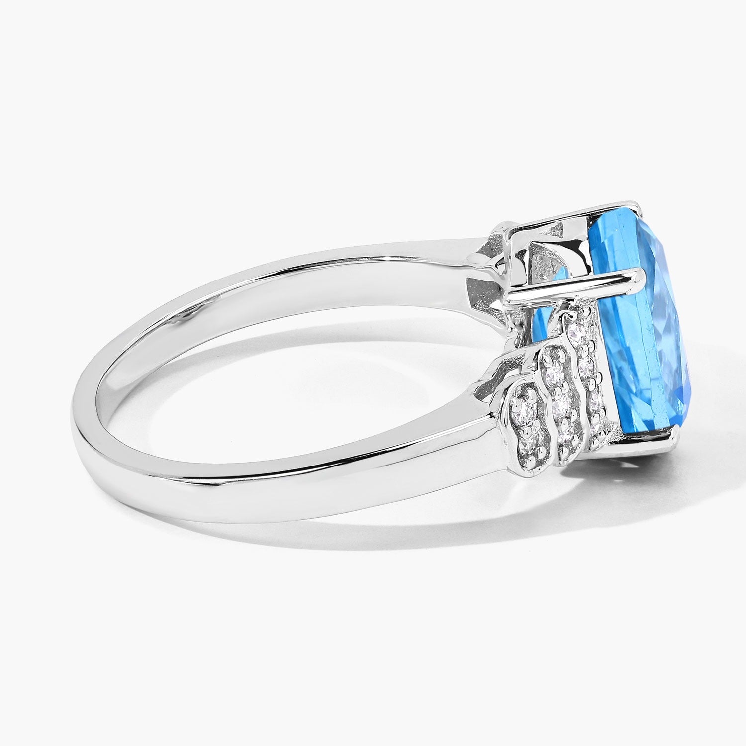 2.55 Ct Oval Swiss Blue Topaz & Lab Diamond Prong Silver Bridge Ring