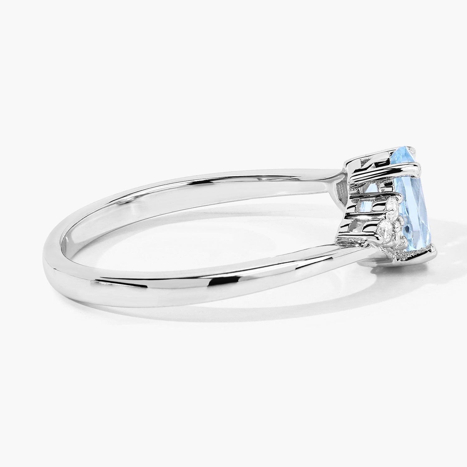0.60 Ct Oval Blue Aquamarine and Lab Diamond Prong Sterling Silver Bypass Ring