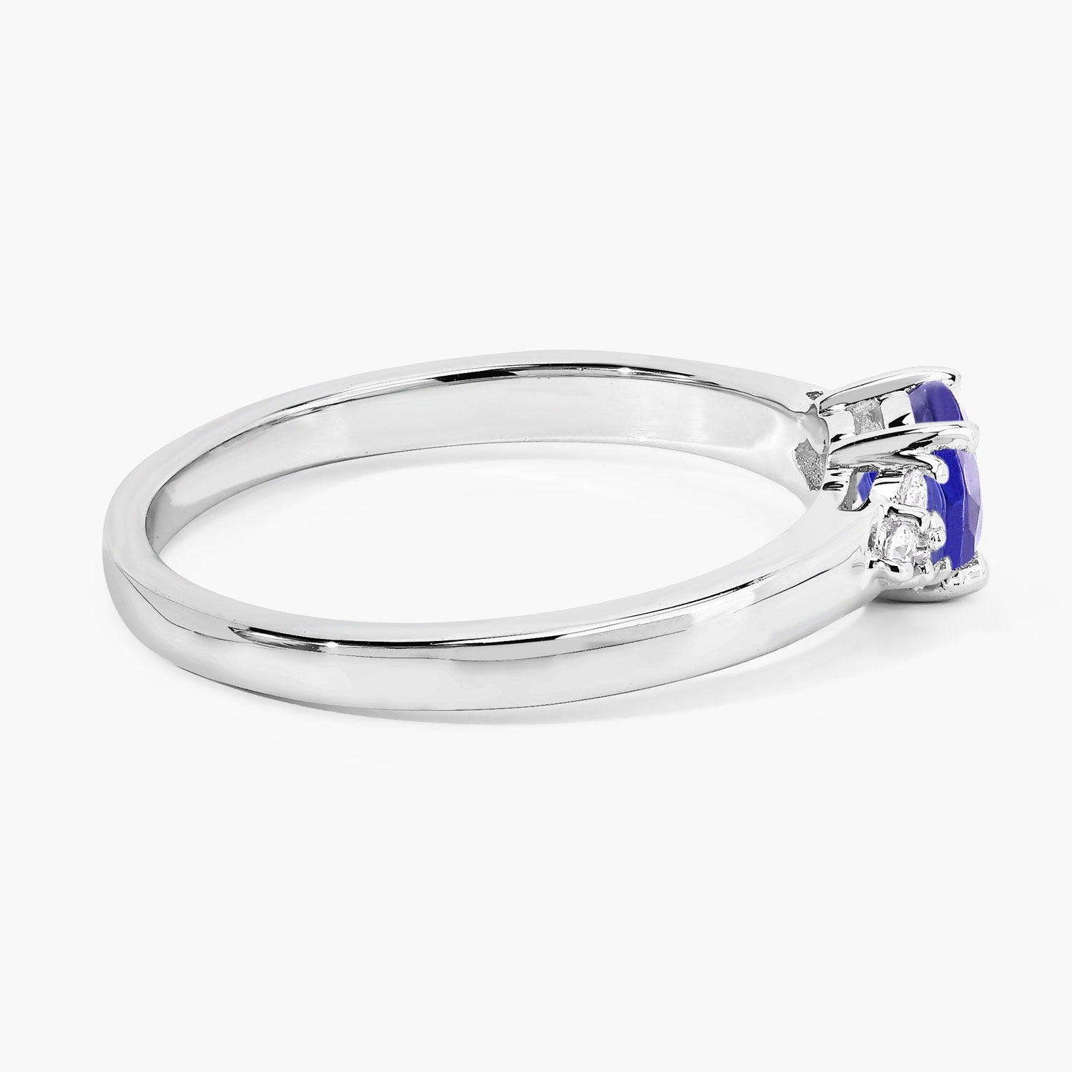 0.56 Ct Genuine Tanzanite and Lab Diamond Silver Round Ring
