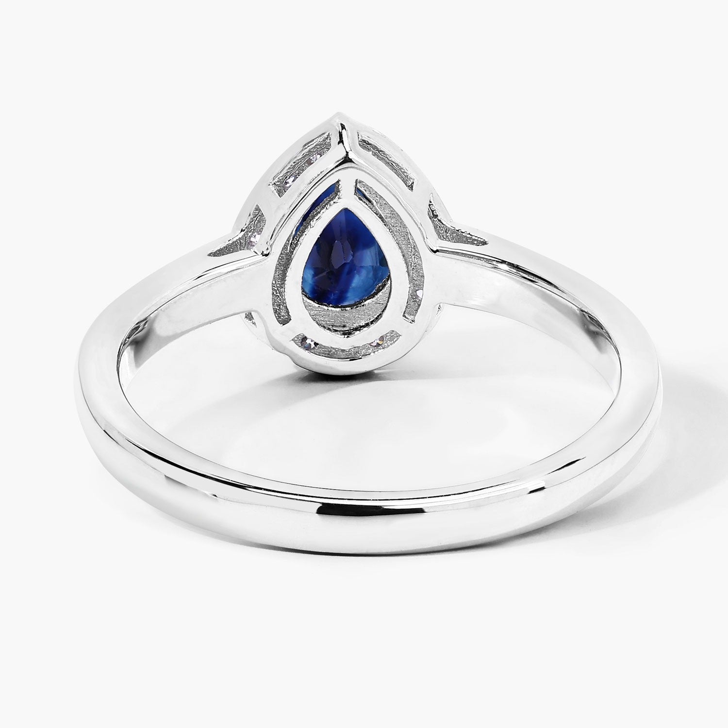 0.80 Ct Pear Blue Sapphire & Lab Diamond Prong Silver Halo Ring