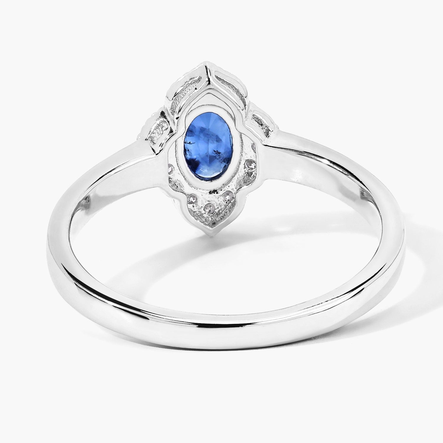 0.55 Ct Oval Blue Sapphire and Lab Diamond Silver Prong Floral Halo Ring