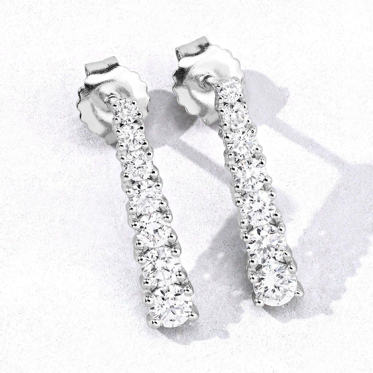 1.00 Cttw Round White Lab Diamond Prong Rhodium Plated Silver Graduated Linear Drop Earrings