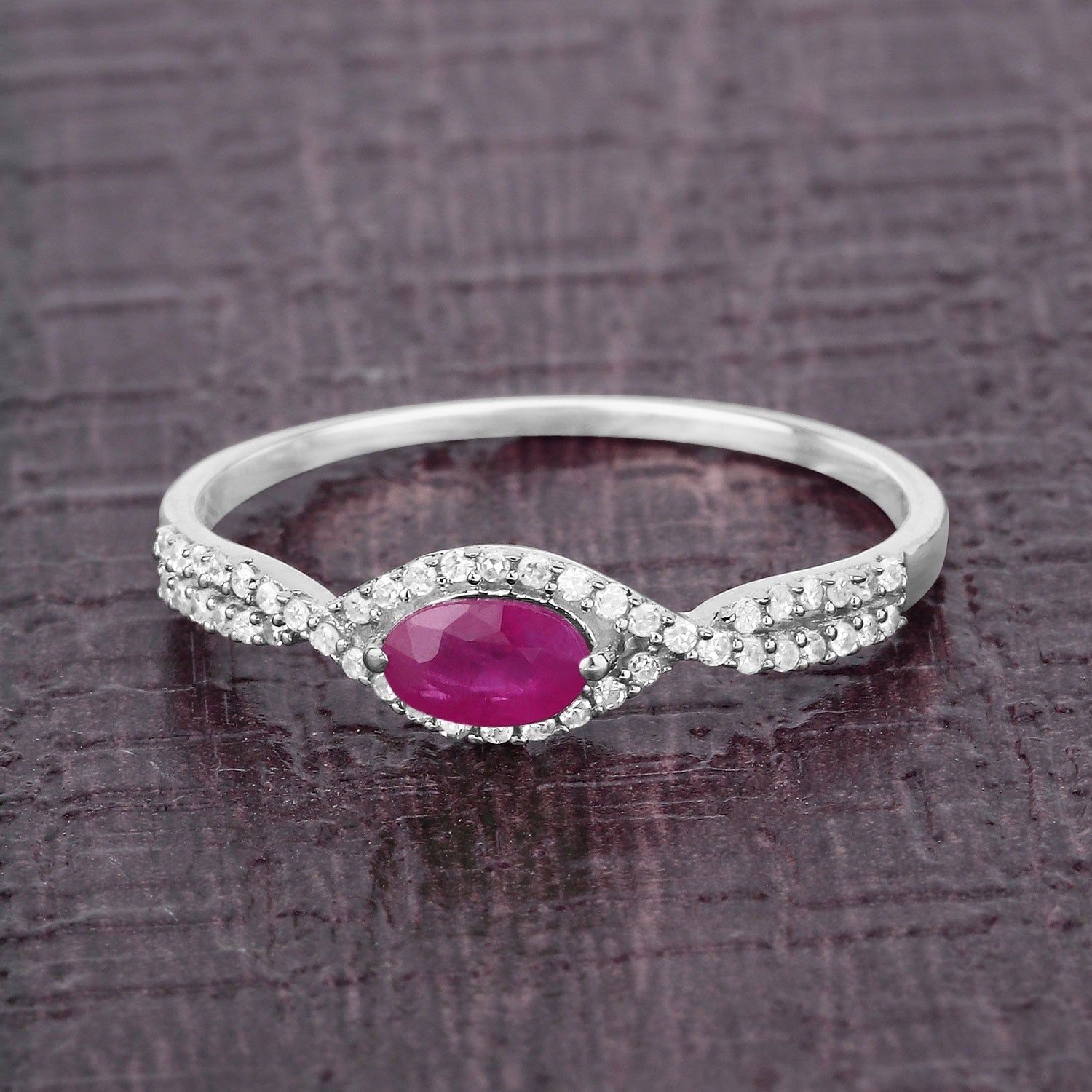 0.40 Ct Oval Shaped Pink Ruby and White Diamond 14K White Gold Crossover Halo Ring