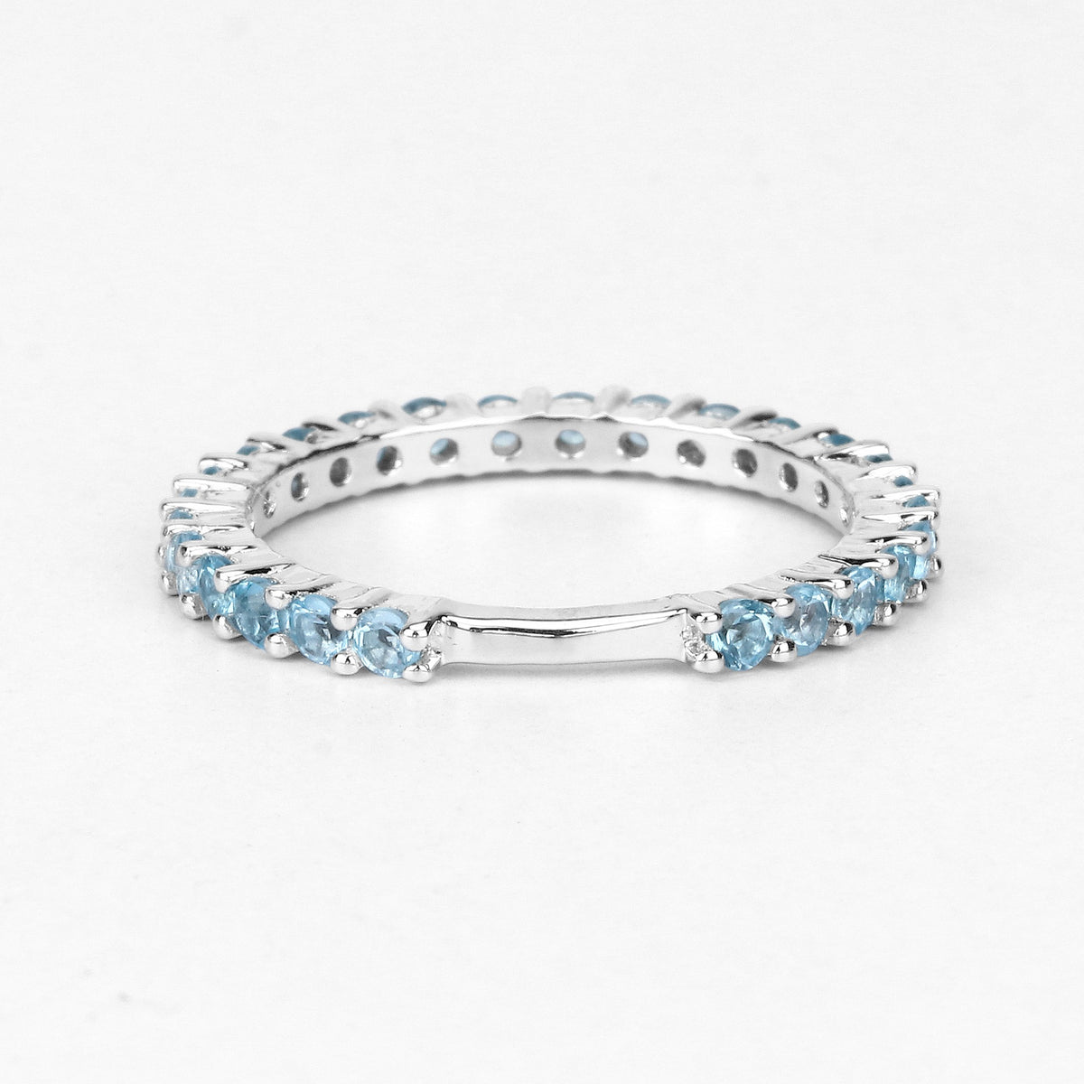0.94 Ct Round Swiss Blue Topaz Rhodium Over 925 Sterling Silver Eternity Band Ring