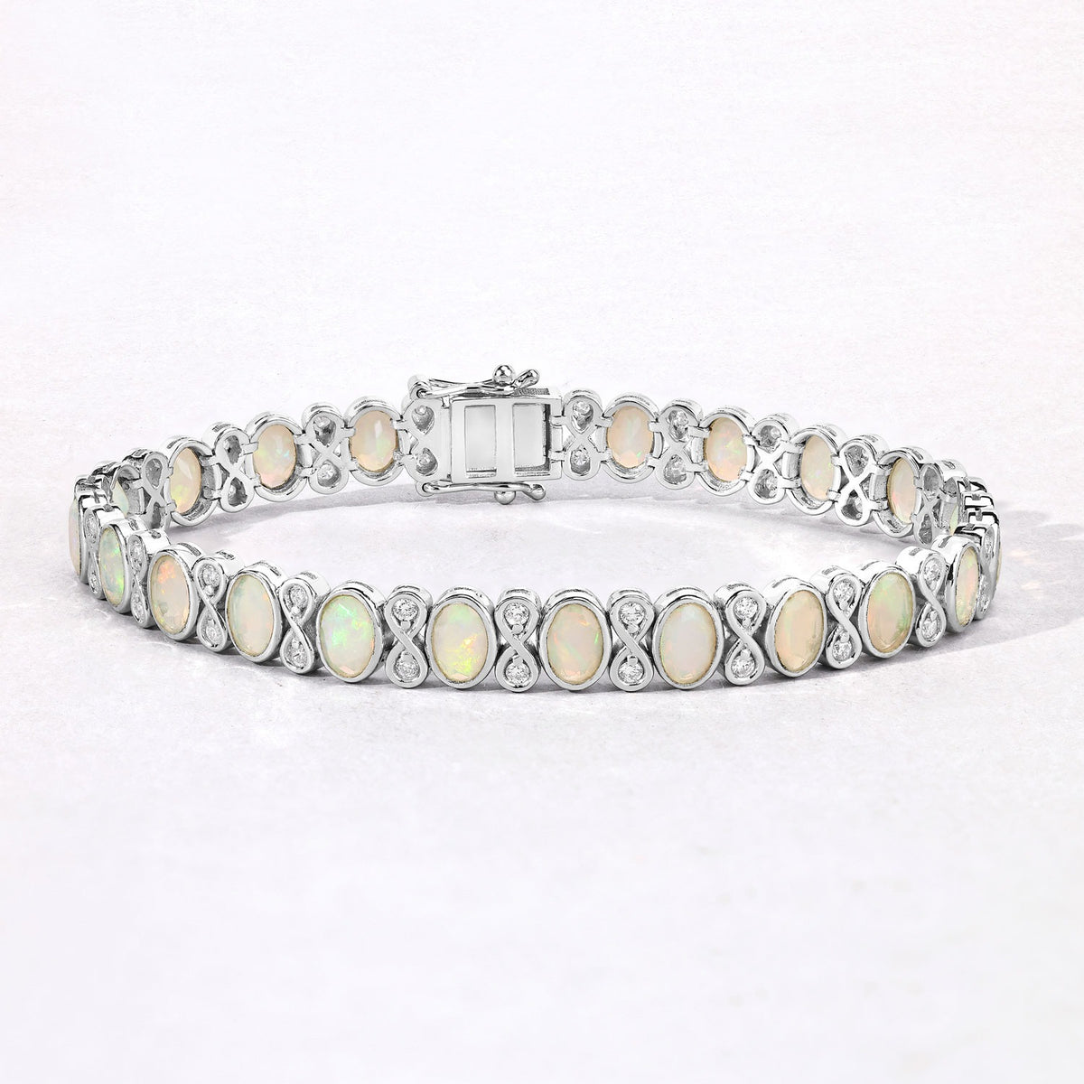 6.25 Cttw Oval White Ethiopian Opal Lab Grown Diamond Sterling Silver Tennis Infinity Bracelet