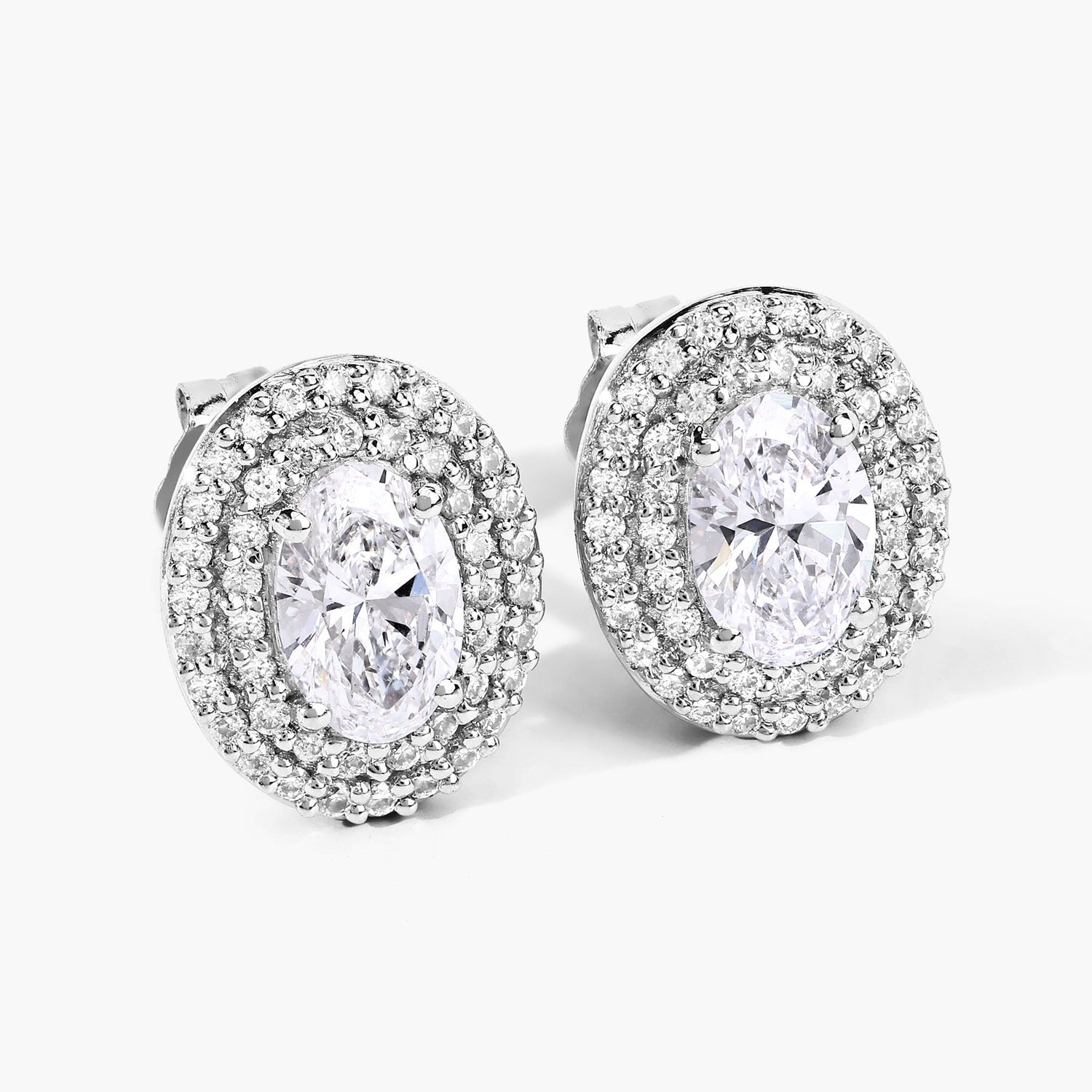 1.32 Ct. Oval Lab Grown Diamond Prong Platinum Double Bridal Halo Stud Earrings