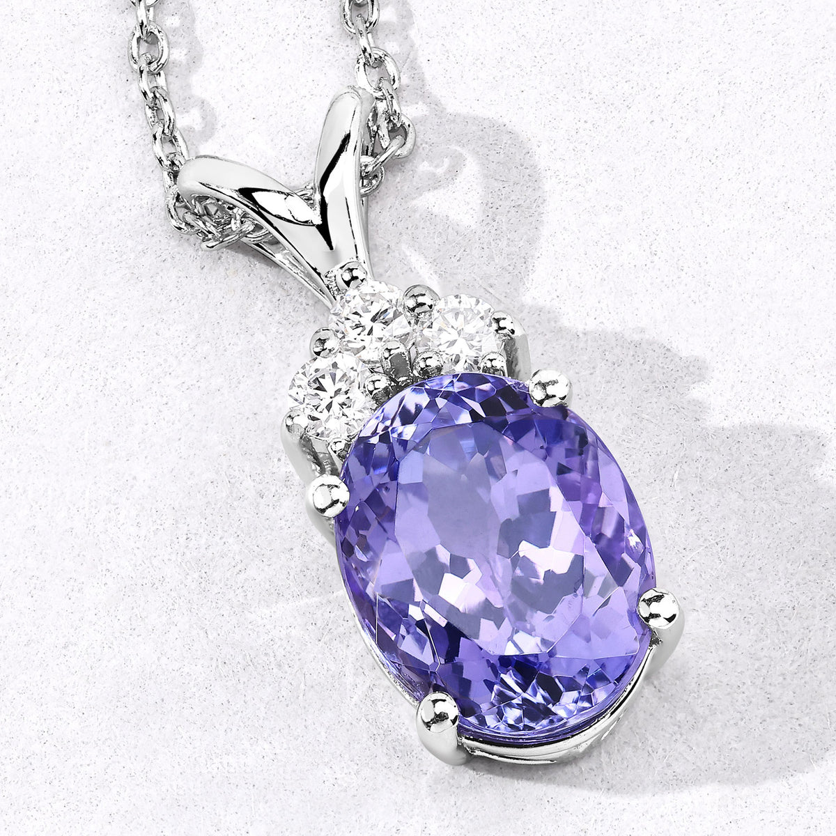 3.47 Cttw Oval Violet Tanzanite and Lab Diamond Rhodium over Silver Crown Accent Pendant Necklace