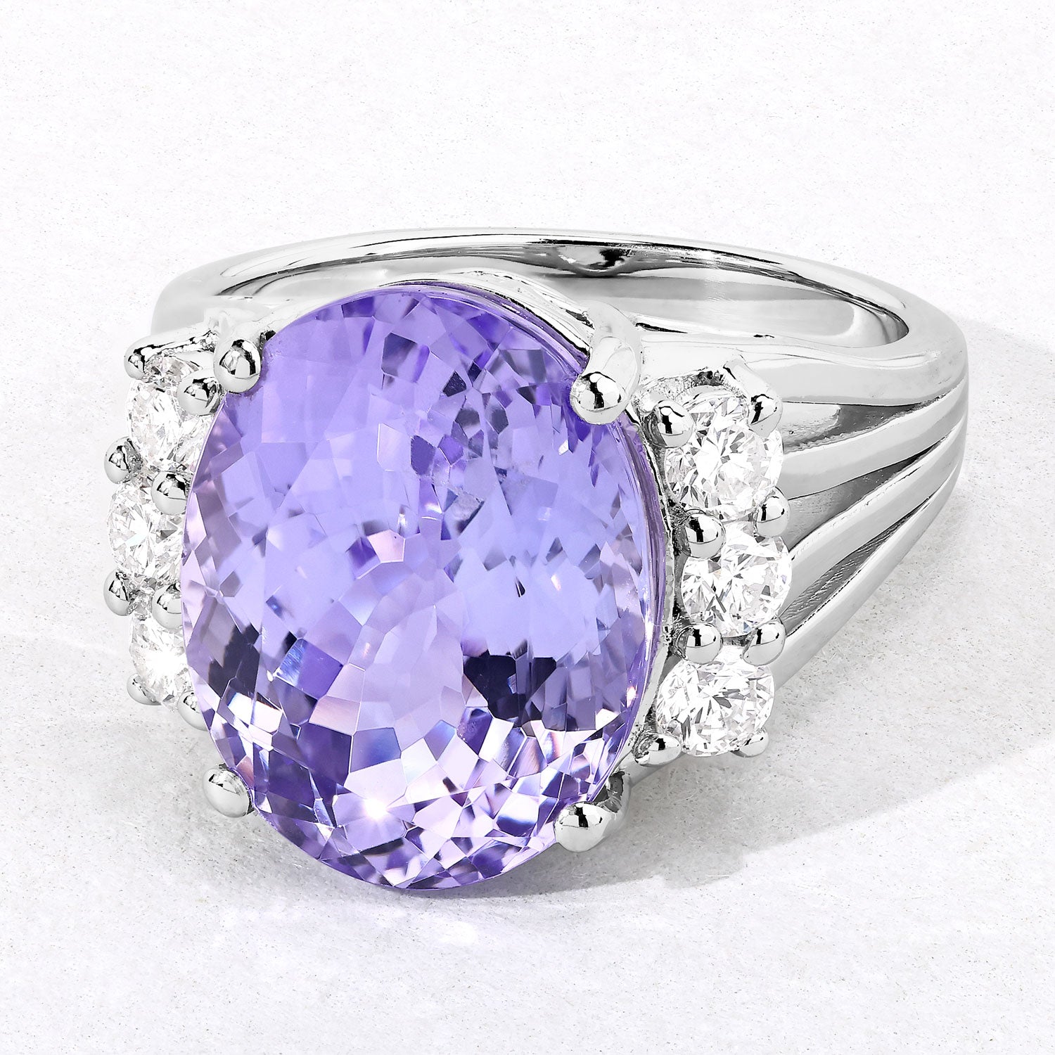 10.43 Cttw Oval Violet Tanzanite and Lab Diamond Rhodium over Silver Bridge Ring