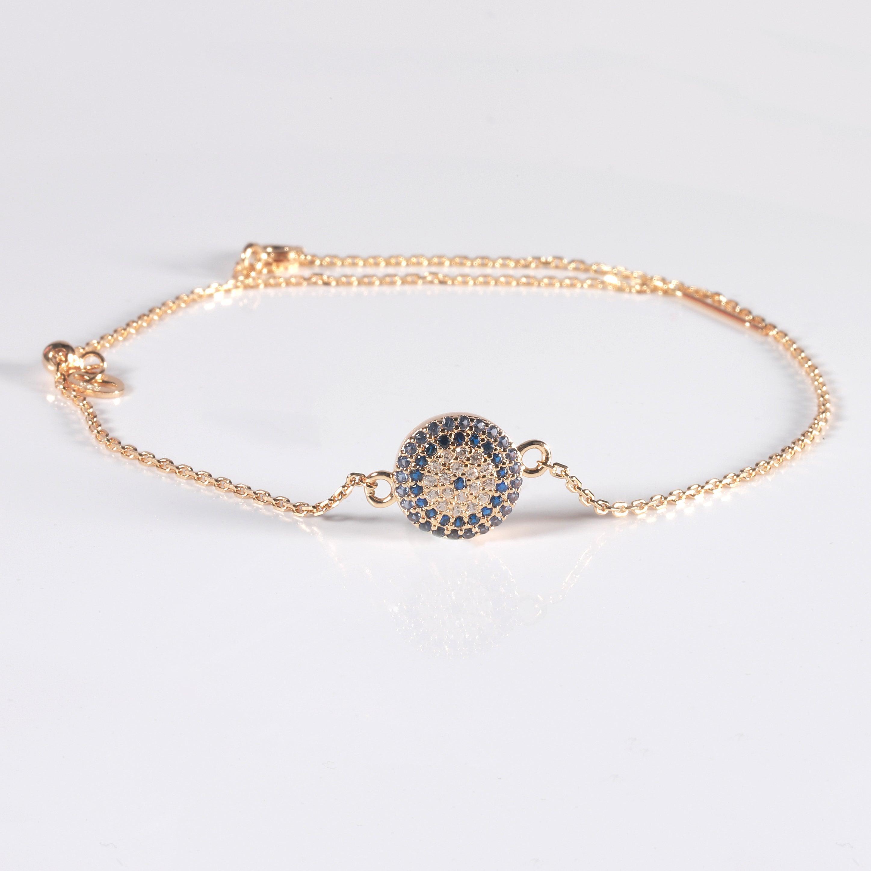 Evil Eye Bracelet on a model Gold Plated Silver Evil Eye Blue Sapphire Protection Bracelet Gift for Her Classic Sapphire Evil Eye Bracelet - FineColorJewels