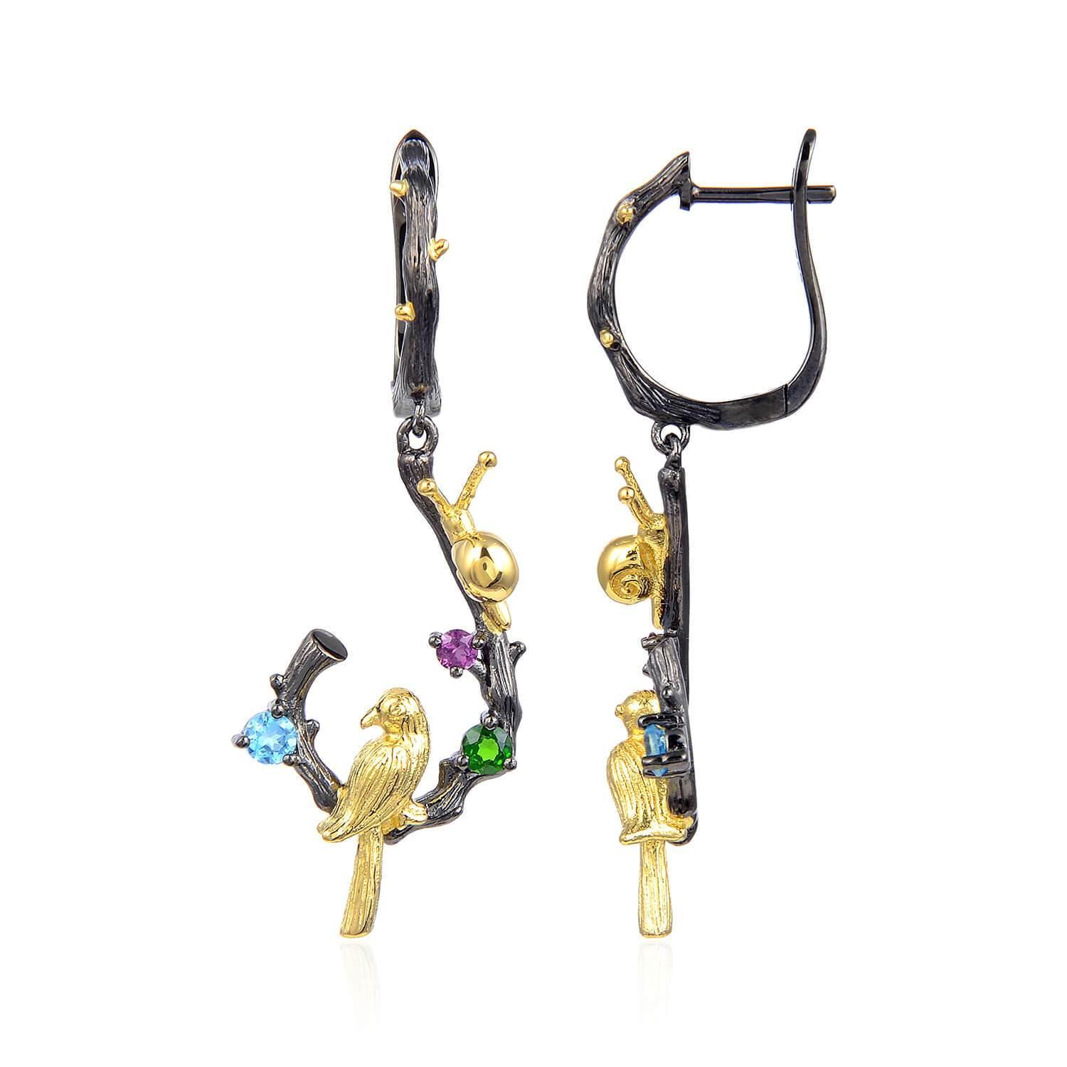 Exotic Nature Inspired Gold Plated Robin Earrings.
$ 50 - 100, Blue Topaz, Garnet, Red, Green, Blue, Round, 925 Sterling Silver, 925 Sterling Silver Ð Gold Plated Yellow, Dangle