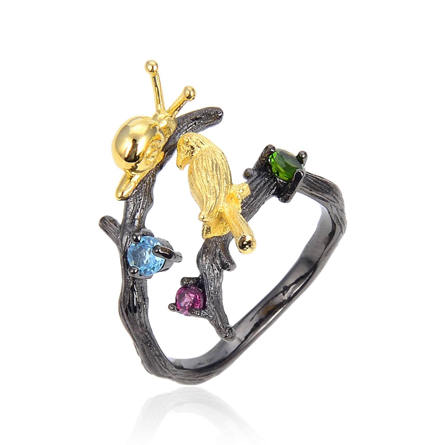 Exotic Nature Inspired Gold Plated Robin Ring.
$ 50 & Under, Blue Topaz, Garnet, Red, Green, Blue, Round, 925 Sterling Silver, 925 Sterling Silver Ð Gold Plated Yellow, Fashion