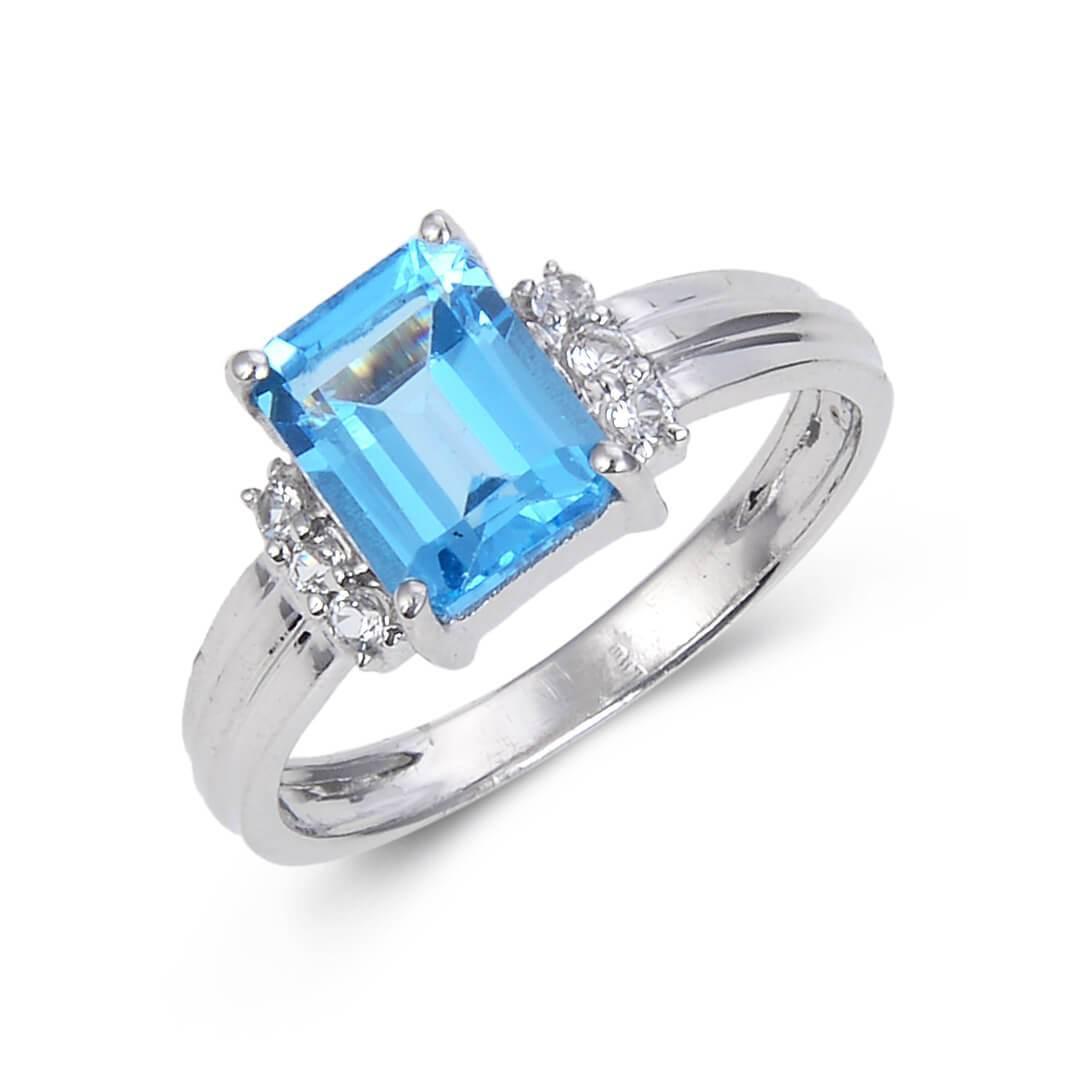 Octagon Emerald Cut ring Accented with White Topaz on a model hand 925 sterling silver