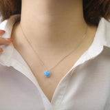 model showcasing Blue Opal Round Halo Necklace - FineColorJewels