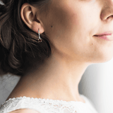 model showcasing Natural Garnet Dainty Round Hoop Earrings | Red Garnet Hoop Earrings Rhodium Plated Silver Earrings 