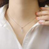 model showcasing Petite Round Cut Genuine Pink Sapphire Pendant Necklace 