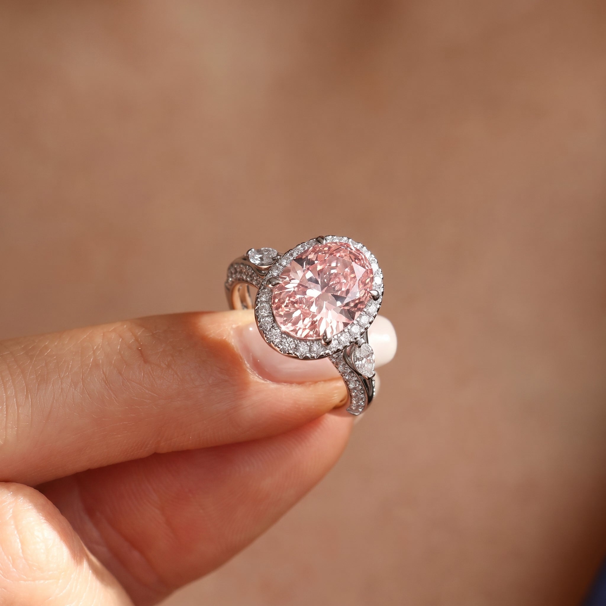 3Cttw Oval Shaped Pink Lab Grown Diamond (F/VS) Three Stone Halo Enagement Ring 14K Gold