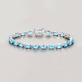 Genuine Swiss Blue Topaz Tennis Bracelet