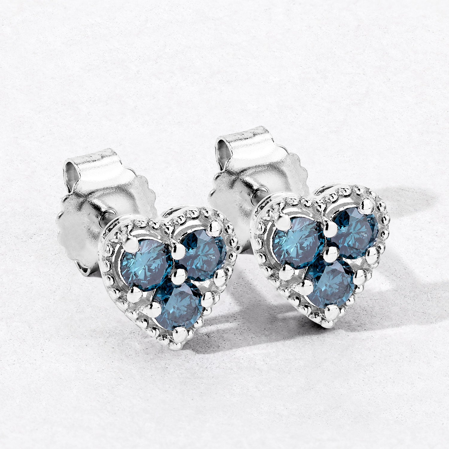 0.50 Cttw Round Teal Blue Diamond Rhodium Plated Silver Heart Stud Earrings