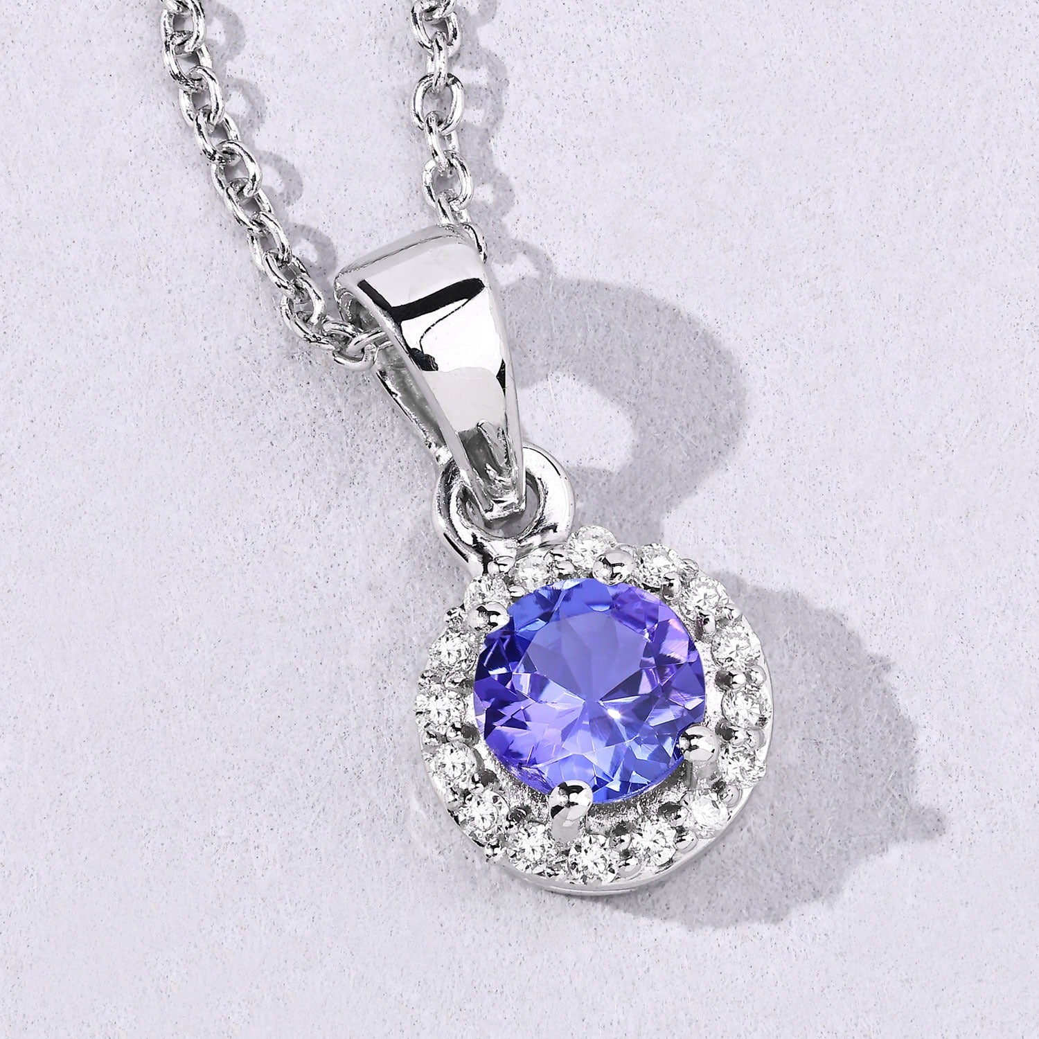 0.57 Ct Genuine Tanzanite and Lab Diamond Silver Round Necklace