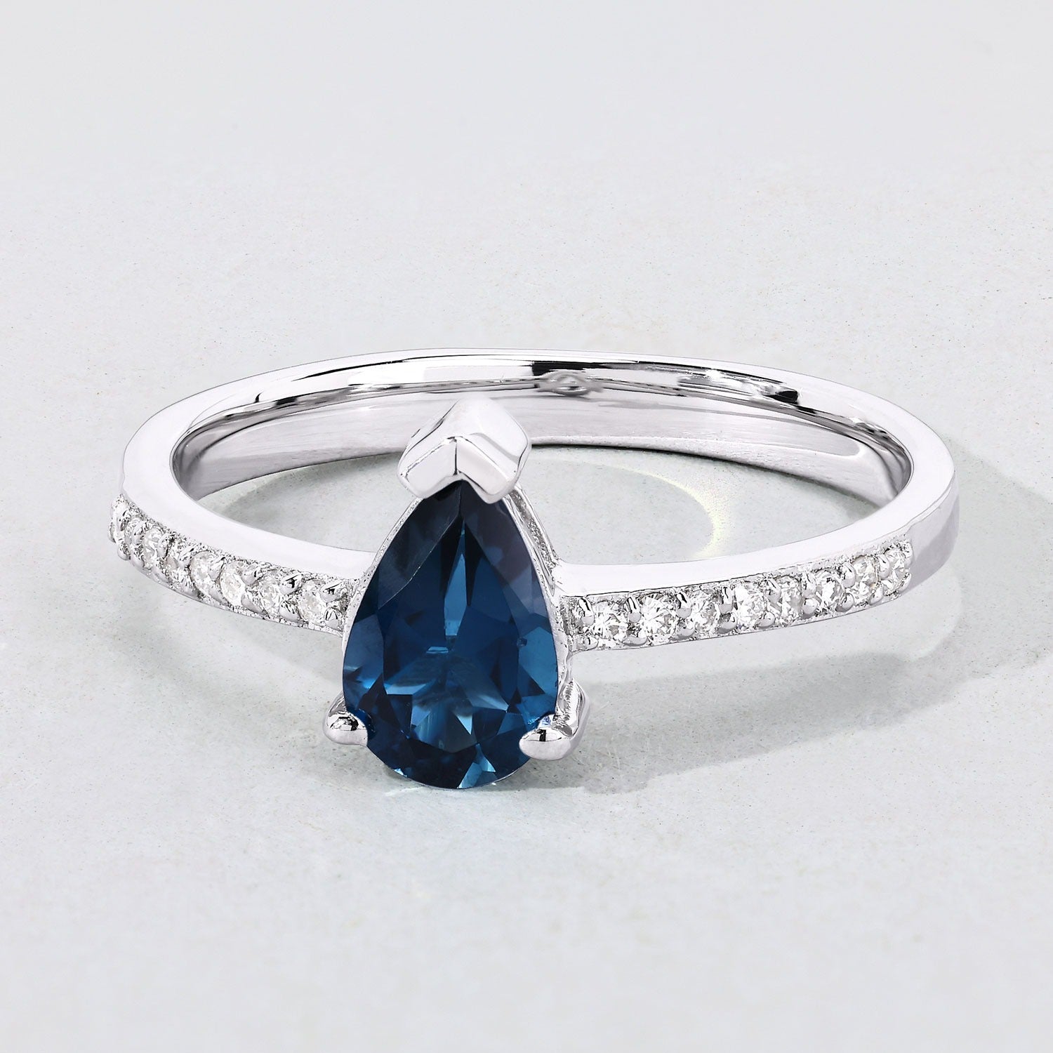1 Ct Pear London Blue Topaz Lab Diamond V-Prong Silver Pave Bridge Ring