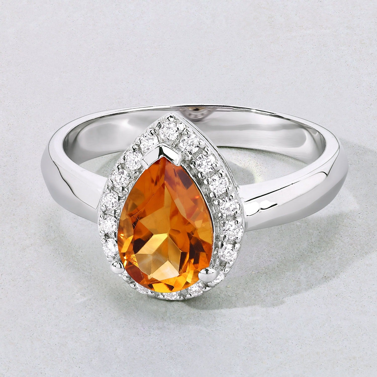 1.23 Ct Genuine Pear-Shaped Citrine and Diamond Silver Halo Ring