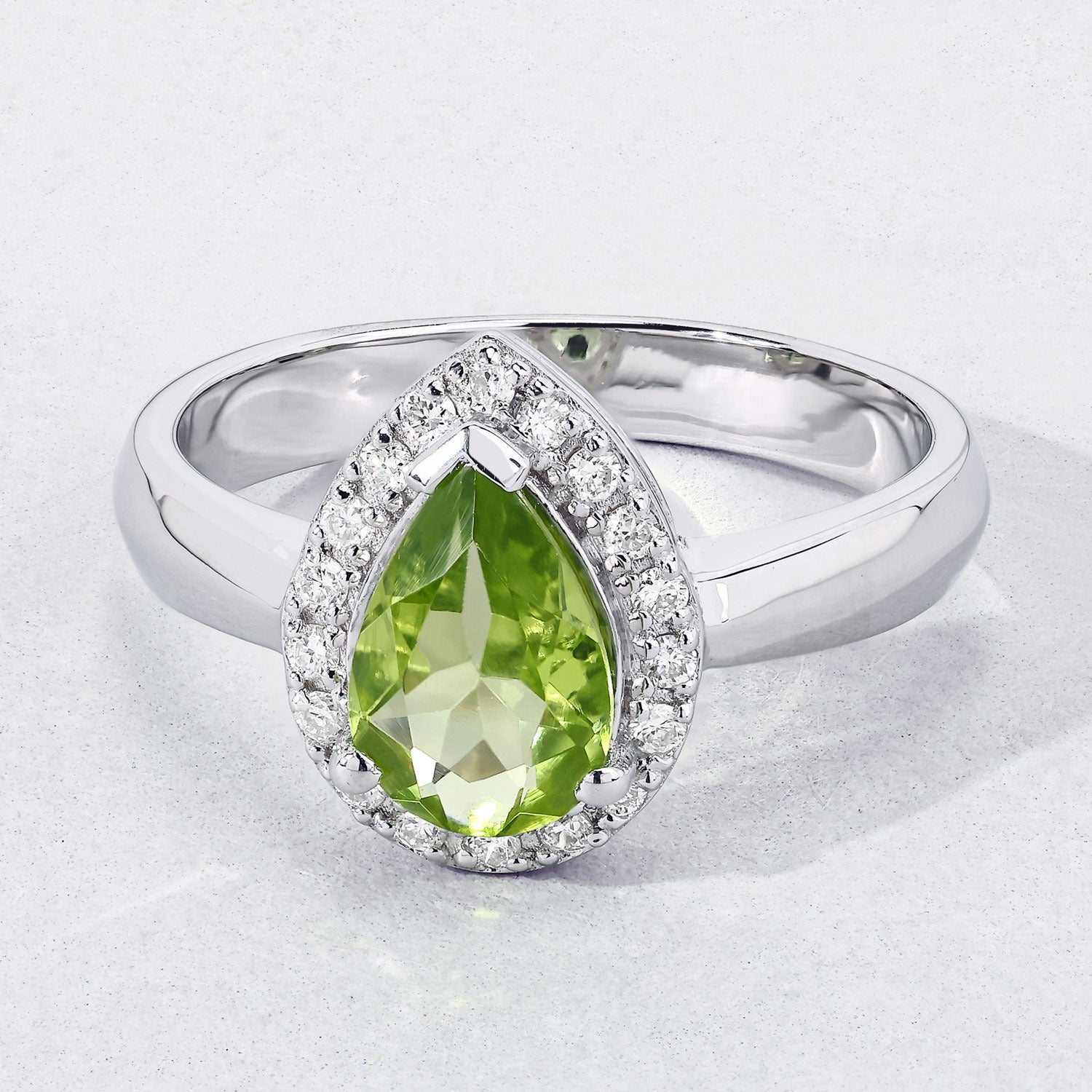 1.28 Ct Genuine Pear Shaped Peridot and Lab Diamond Silver Halo Engagement Ring