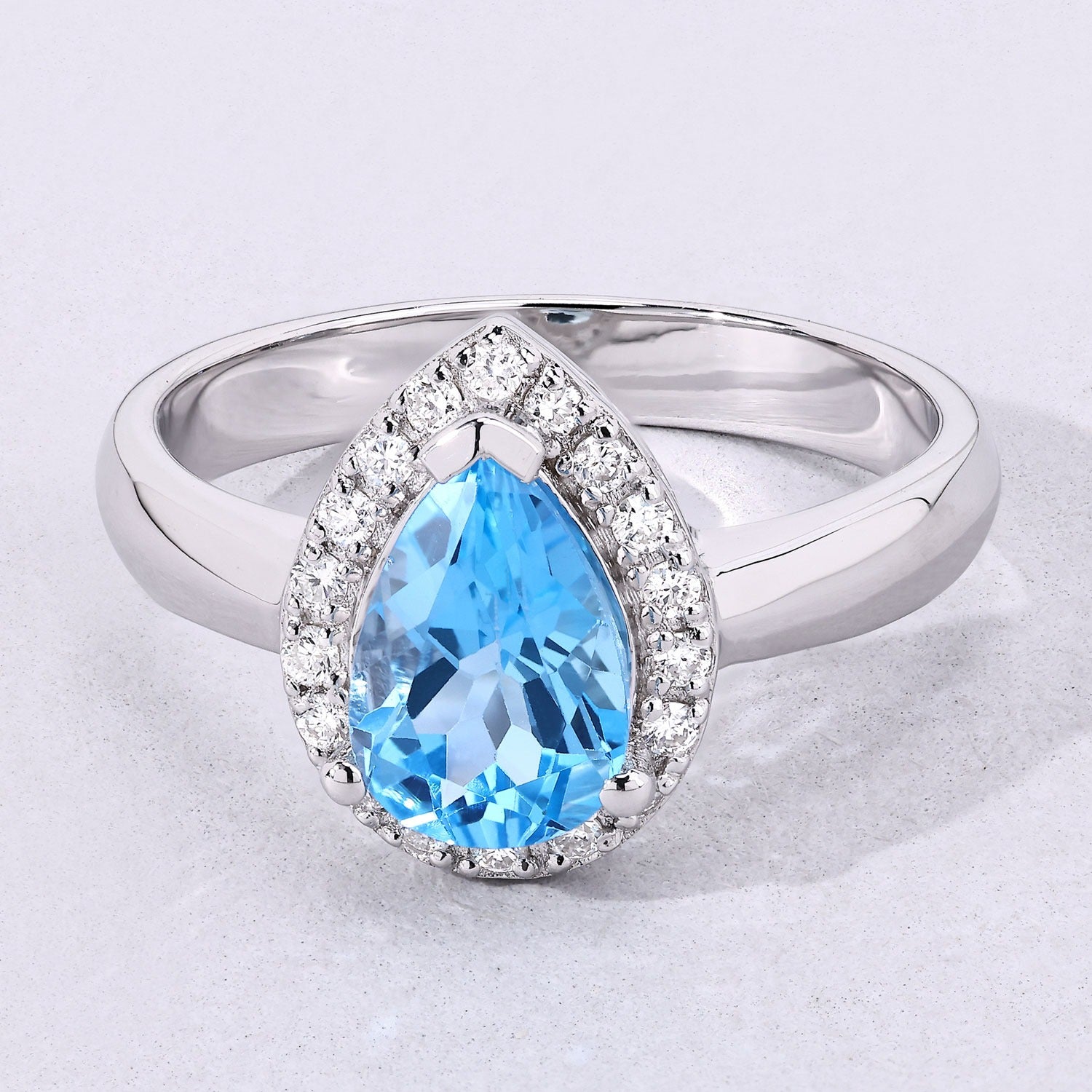 1.30 Ct Oval Swiss Blue Topaz & Lab Diamond Prong Silver Halo Engagement Ring