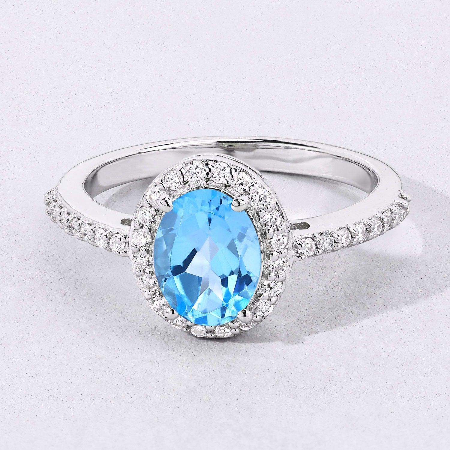 1.60 Ct Oval Swiss Blue Topaz and Lab Diamond Prong Silver Halo Pave Ring
