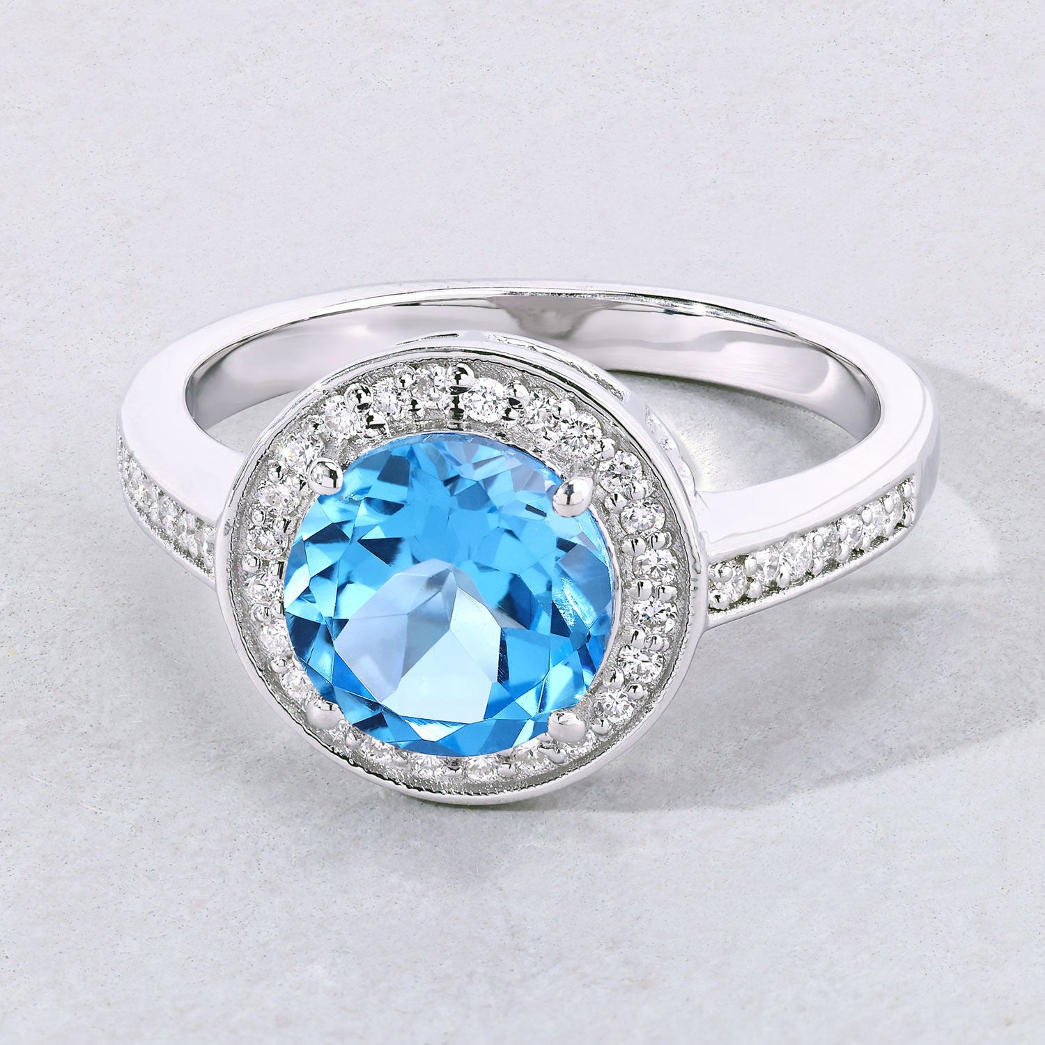 2.46 Ct Genuine Swiss Blue Topaz and Lab Diamond Silver Halo Ring