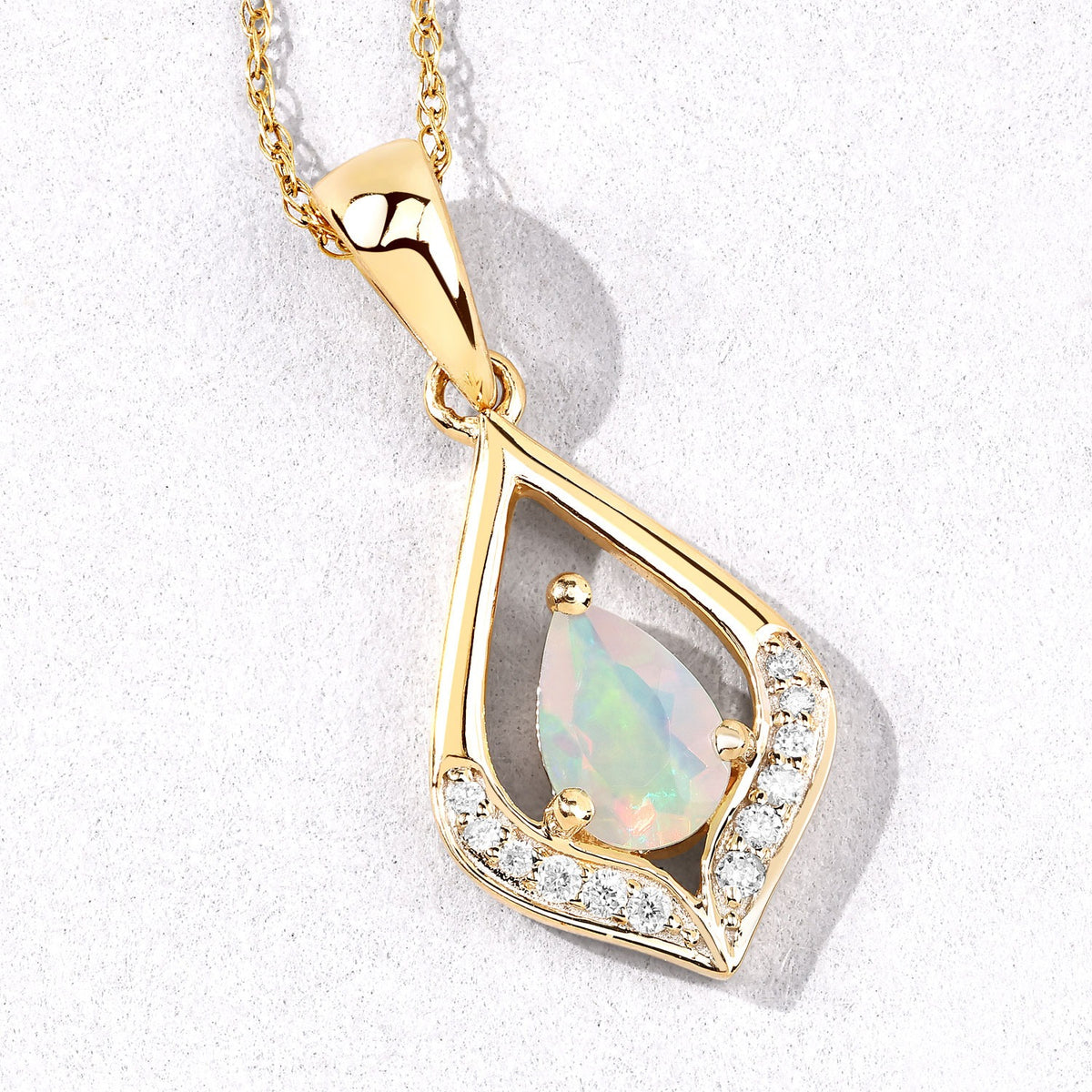 0.29 Cttw Pear White Ethiopian Opal White Natural Diamond 14K Yellow Gold Teardrop Pendant