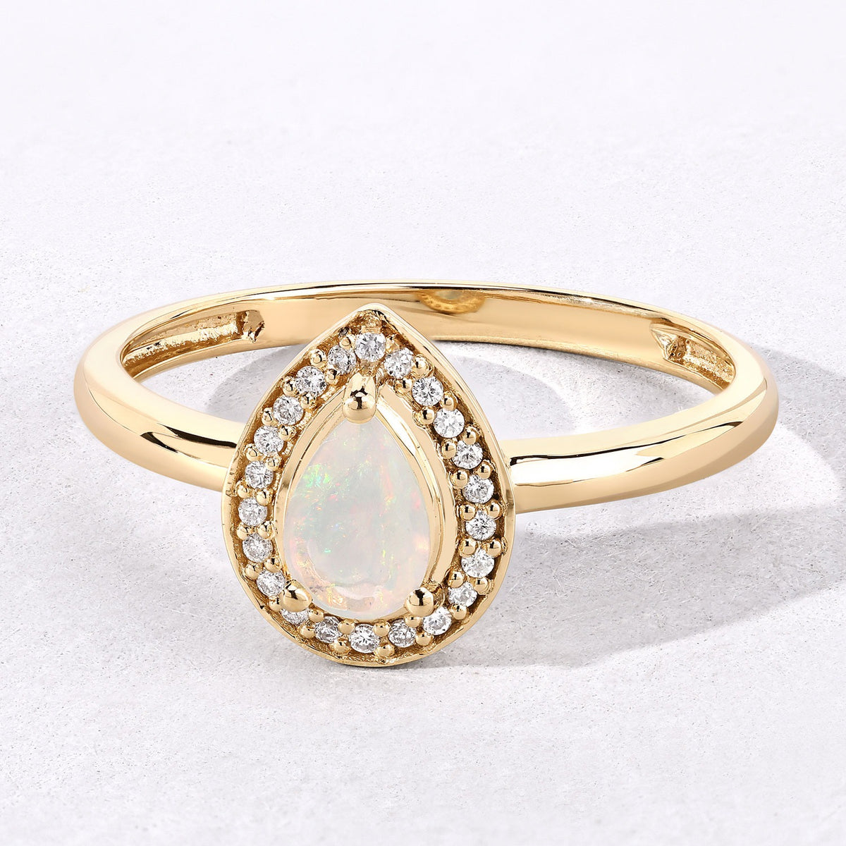 0.31 Cttw  Pear White Ethiopian Opal White Diamond 14K Yellow Gold Halo Ring