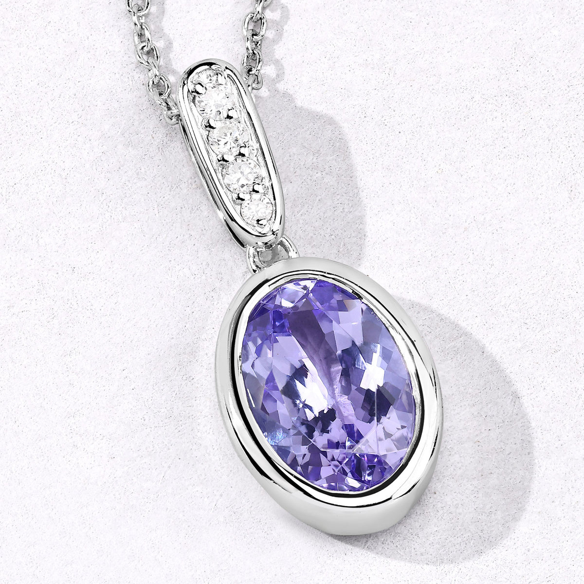 2.83 Cttw Oval Violet Tanzanite and Lab Diamond Bezel Rhodium over Silver Solitaire Drop Pendant Necklace