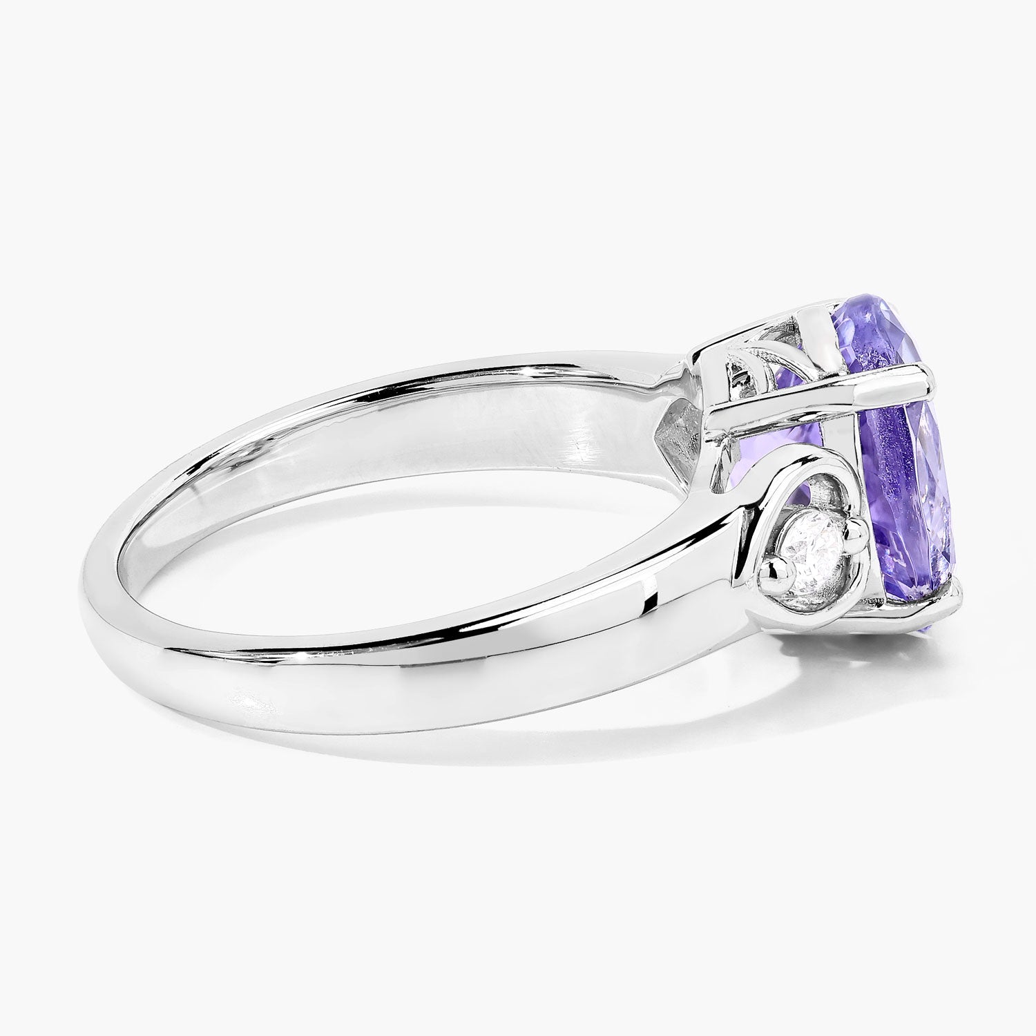 3.23 Cttw Oval Violet Tanzanite and Lab Diamond Rhodium over Silver 3-Stone Ring