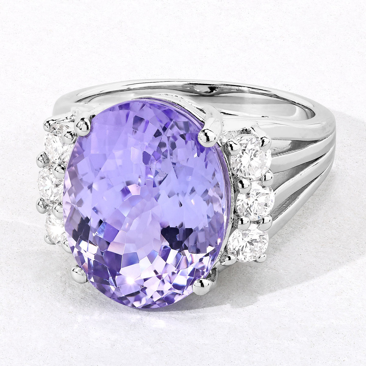 10.43 Cttw Oval Violet Tanzanite and Lab Diamond Rhodium over Silver Bridge Ring