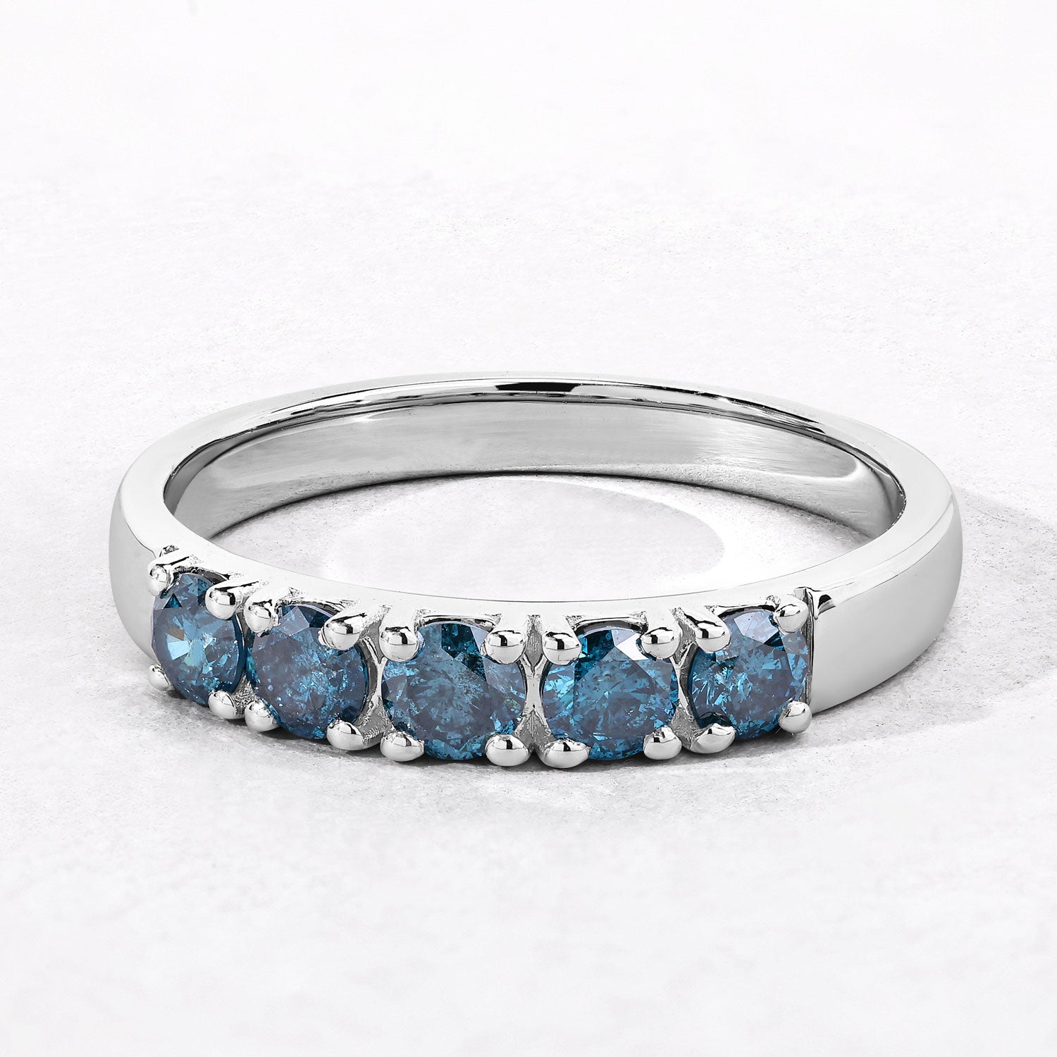 0.76 Cttw Round Teal Blue Diamond Rhodium Over Silver Five Stone Band Ring