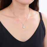 Classic White Topaz Pear Shaped Pendant.
$ 50 & Under, White Topaz, White, Pear, 925 Sterling Silver, Halo