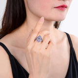 Enchanting Tanzanite Pear-Shaped Ring.
$ 100 -150, 6, 7, Round, Tanzanite, Blue Violet, White, White Topaz, 925 Sterling Silver, Statement